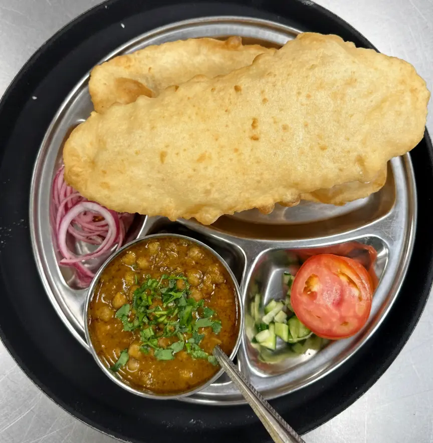 Chole Puri - spicy chickpea curry with fried bread at Flavours Of Indian Saskatoon